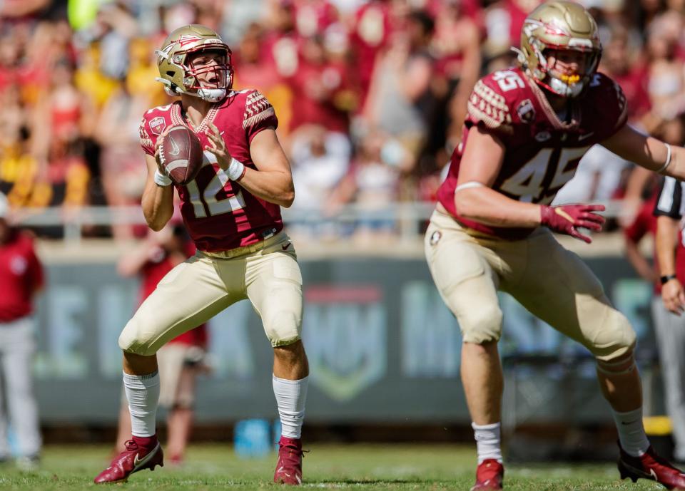 Florida State Seminoles quarterback Chubba Purdy (12) looks to pass. The Florida State Seminoles defeated the Massachusetts Minutemen 59-3 at Doak Campbell Stadium on Saturday, Oct. 23, 2021.