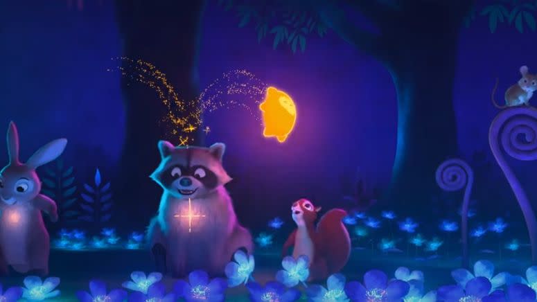 star gives woodland animals some magic in a scene from wish