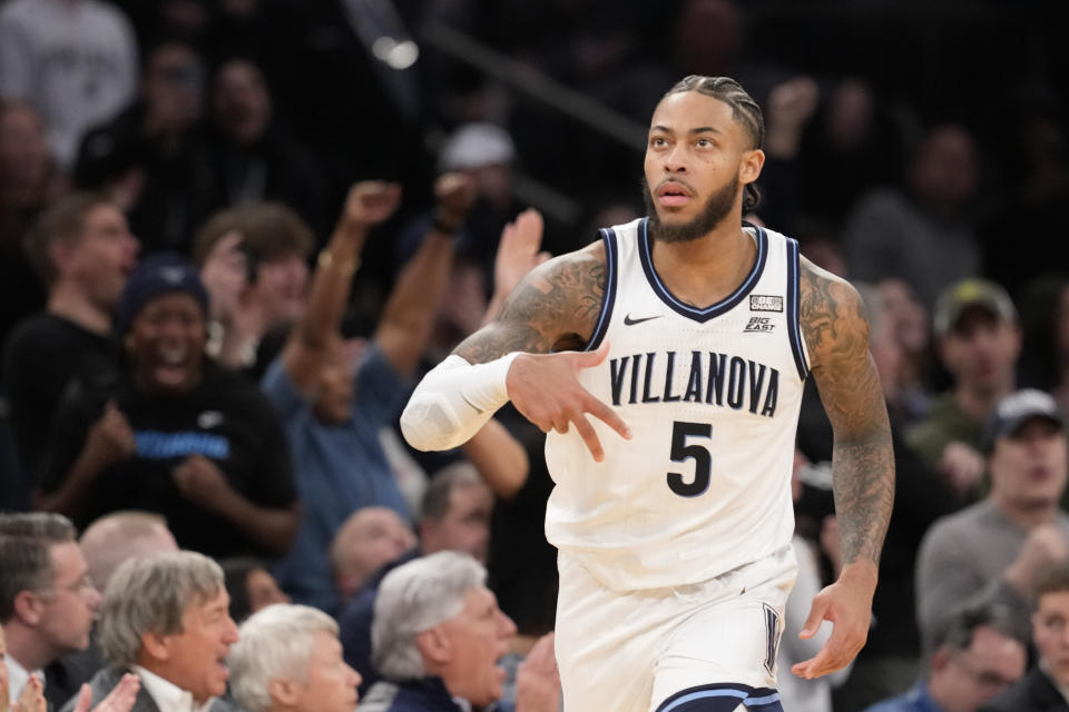 Villanova guard Justin Moore reacts after shooting the game winning three-point basket during the second half of an NCAA college basketball game against the DePaul in the first round of the Big East Conference tournament, Wednesday, March 13, 2024, in New York. (AP Photo/Mary Altaffer)