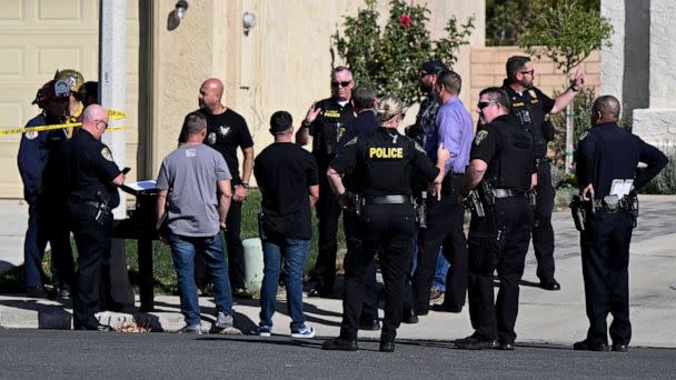 PHOTO: Firefighters and Riverside Police gather outside a burned home in Riverside, Calif., on Nov. 25, 2022, following a house fire. Three bodies were found in the house which police are investigating as a homicide. (Will Lester/Inland Valley Daily Bulletin/SCNG via AP)