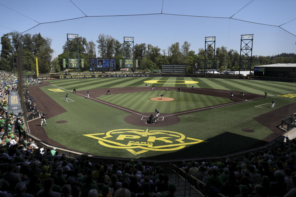 Oregon pitcher Jackson Pace (41), center, throws against Oral Roberts during the first inning of an NCAA college baseball tournament super regional game Sunday, June 11, 2023, in Eugene, Ore. (AP Photo/Amanda Loman)