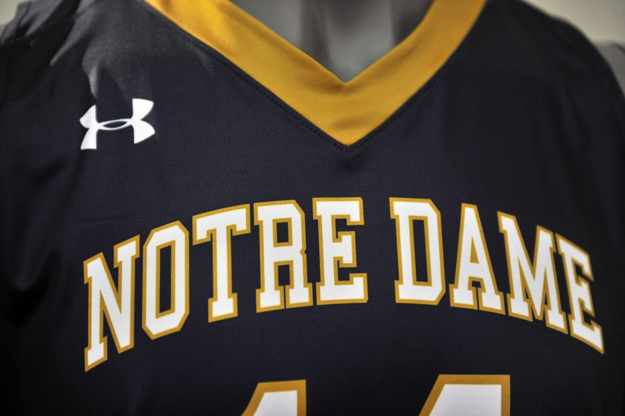 Notre Dame athletics have been outfitted by Under Armour since 2014, and that relationship will continue after the school agreed to a new 10-year deal with apparel company. (AP Photo/Joe Raymond)