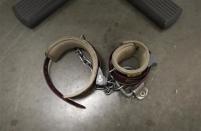 An ankle shackle used by prisoners during meetings with their lawyers is seen on the floor of the conference room at Camp VI, a prison used to house detainees at the U.S. Naval Base at Guantanamo Bay, March 5, 2013. REUTERS/Bob Strong