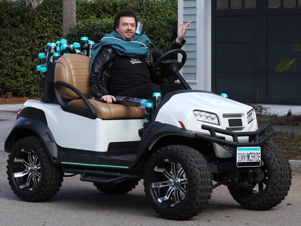 Danny McBride in a gold cart