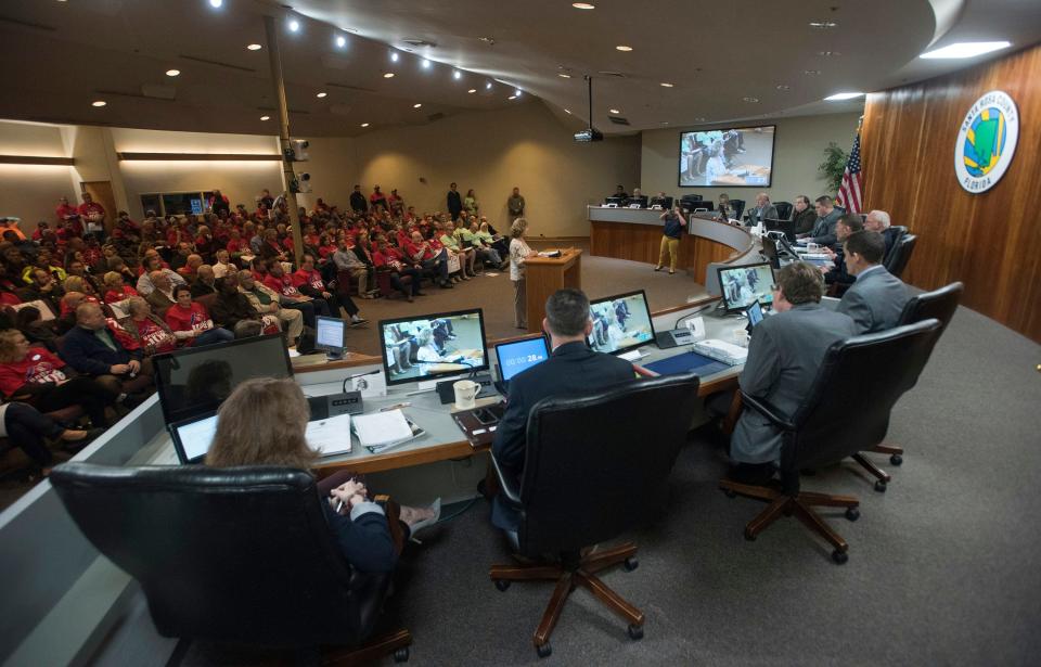 The Santa Rosa County Commission listens to public comments Feb. 25, 2019. A large crowd of tradesman gathered in the chambers to voice their concerns over impact fees and limiting building growth.