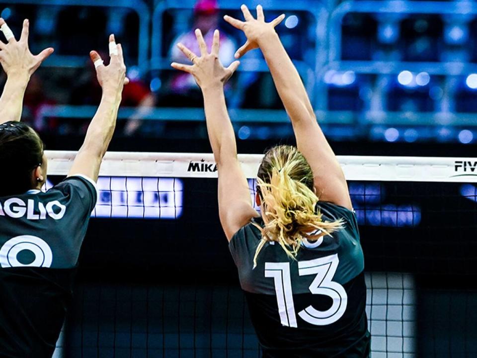 Emily Maglio and Brie King, right, had two block points apiece in Canada's four-set victory over Thailand in the first match of Phase 2 for both teams at the women's volleyball world championship on Tuesday in Łódź, Poland. (Courtesy Volleyball World - image credit)