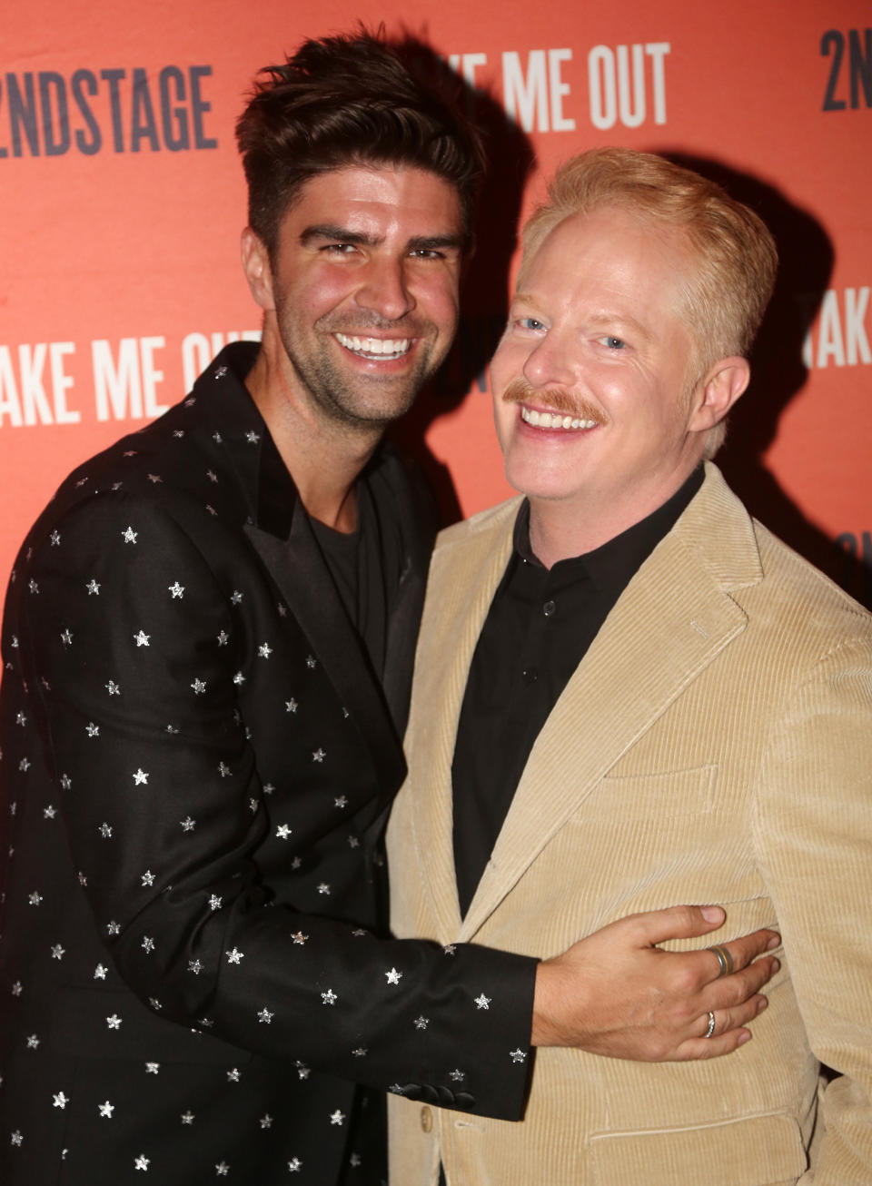 Justin Mikita and Jesse Tyler Ferguson pose at the opening night party for Second Stage Theater's production of "Take Me Out" on Broadway