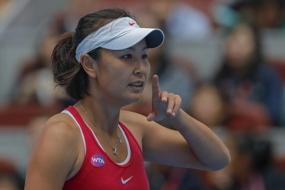 Chinese tennis player Peng Shuai reacts during her women's singles match at the China Open tennis tournament in Beijing on Oct. 5, 2016. When Peng disappeared from public view this month after accusing a senior Chinese politician of sexual assault, it caused an international uproar. But back in China, Peng is just one of several people, activists and accusers alike, who have been hustled out of view, charged with crimes or trolled and silenced online for speaking out about the harassment, violence and discrimination women face every day. (AP Photo/Andy Wong)