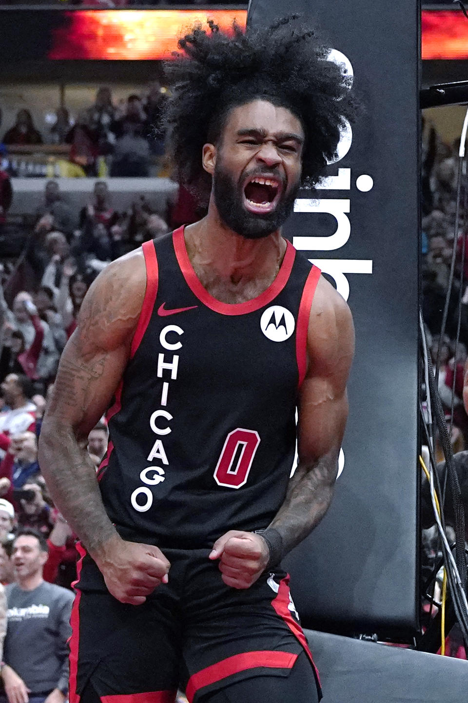 Chicago Bulls guard Coby White reacts after scoring a basket during the second half of an NBA basketball game against the Orlando Magic in Chicago, Friday, Nov. 17, 2023. (AP Photo/Nam Y. Huh)