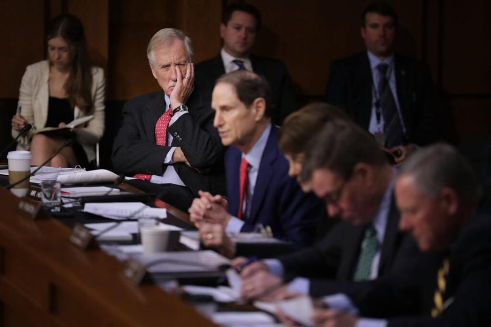 Senate Intelligence Committee member Sen. Angus King (I-ME) (L) listens to fellow committee memebrs question witnesses during a hearing in the Hart Senate Office Building on Capitol Hill March 21, 2018 in Washington, DC. (Photo by Chip Somodevilla/Getty Images)