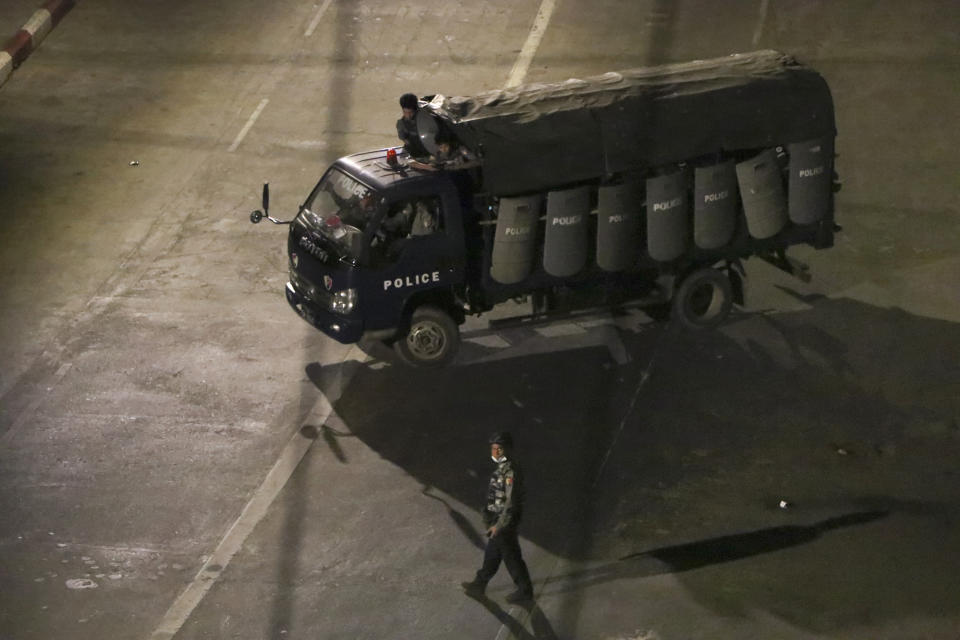 Police patrol on a truck along Hledan road at Kamaryouk township in Yangon, Myanmar, Thursday, April 1, 2021. Protesters in Myanmar on Thursday marked two months since the military seized power by again defying the threat of lethal violence and demonstrating against its toppling of the country's democratically elected government. (AP Photo)