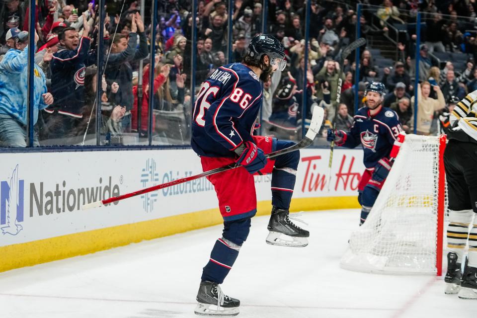 Nov 27, 2023; Columbus, Ohio, USA; Columbus Blue Jackets left wing Kirill Marchenko (86) celebrates a goal during the third period of the NHL game against the Boston Bruins at Nationwide Arena. The Blue Jackets won 5-2.