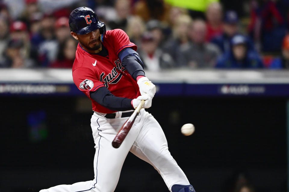 Cleveland Guardians' Gabriel Arias hits a single in the sixth inning of Game 3 of the baseball team's AL Division Series against the New York Yankees, Saturday, Oct. 15, 2022, in Cleveland. (AP Photo/David Dermer)