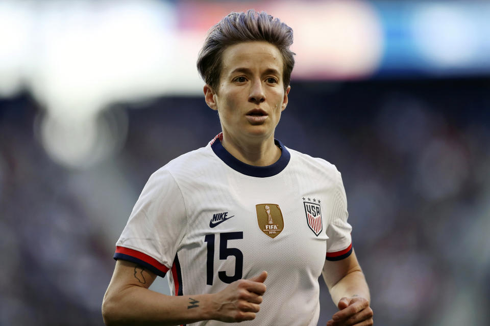 FILE - o, U.S. forward Megan Rapinoe runs during the second half of a SheBelieves Cup soccer match against Spain on March 8, 2020, in Harrison, N.J. Rapinoe says she could not hide her anger over the Supreme Court's decision to overturn the abortion rights provisions of Roe v. Wade, decrying an erosion of rights that women have had for a generation. (AP Photo/Steve Luciano, File)