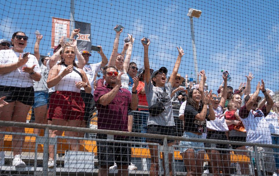 Calallen High School softball fans cheer for the team after their 9-7 win over Liberty High School in the State 4A UIL Championships at Red and Charline McCombs Field in Austin, June 3, 2023.