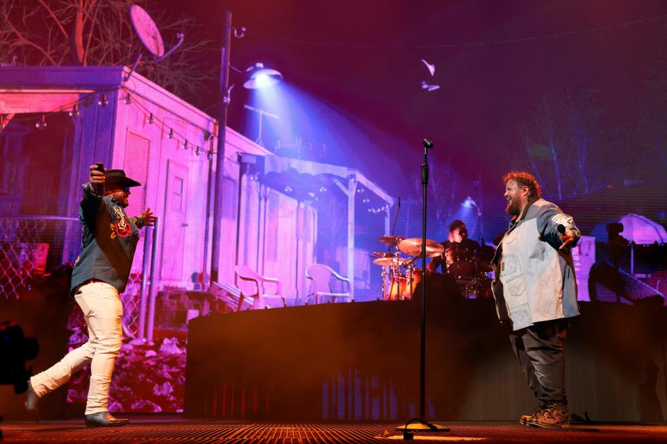 Struggle Jennings and Jelly Roll perform onstage at Bridgestone Arena on December 09, 2022, in Nashville, Tennessee.