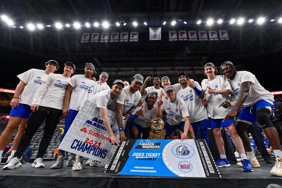 Mar 5, 2023; St. Louis, MO, USA; The Drake Bulldogs pose for a photo with the Missouri Valley Conference trophy after defeating the Bradley Braves in the finals of the Missouri Valley Conference Tournament at Enterprise Center. Mandatory Credit: Jeff Curry-USA TODAY Sports