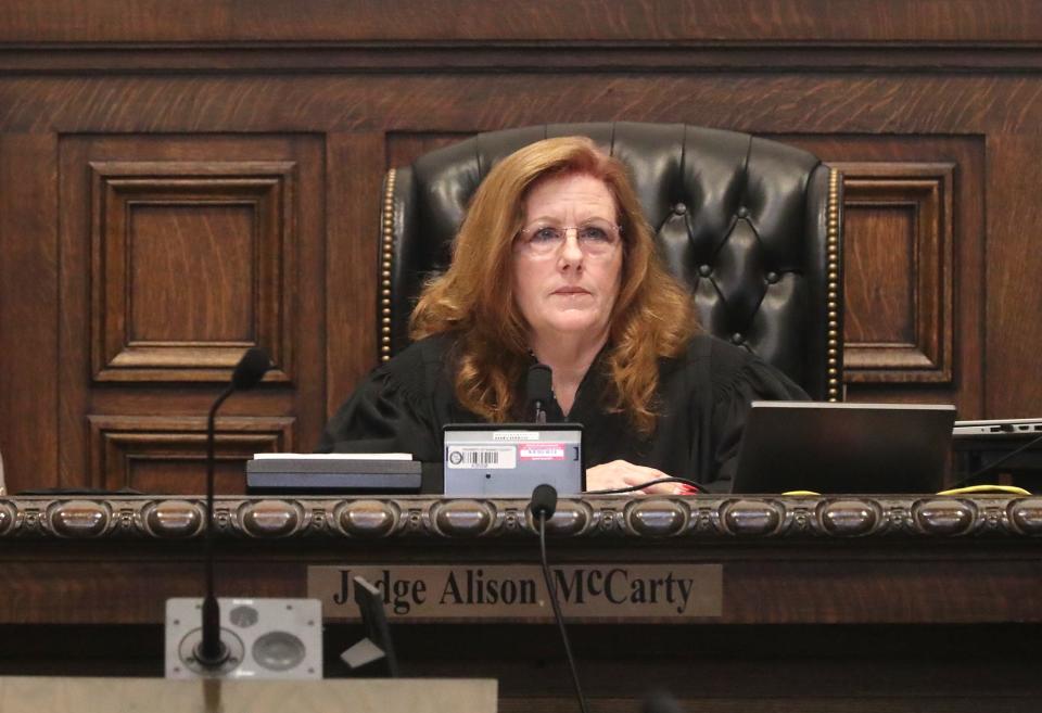 Summit County Common Pleas Judge Alison McCarty listens to opening statements Monday in Darrell Buchanan's murder trial.