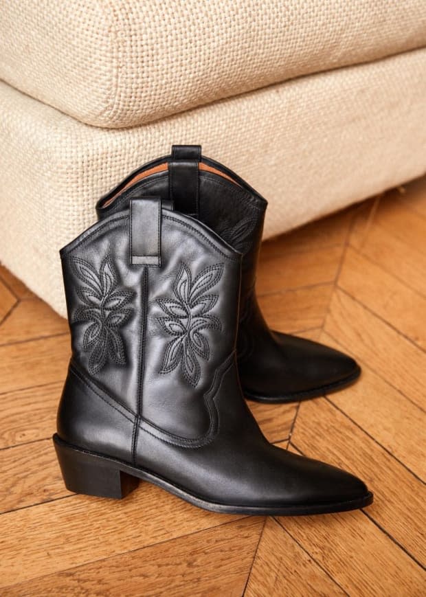 Sézane Penelope Boots, $275,<a href="https://rstyle.me/+_DpzloVNS6iQWjRYdH_Xlg" rel="nofollow noopener" target="_blank" data-ylk="slk:available here;elm:context_link;itc:0;sec:content-canvas" class="link "> available here</a>. 