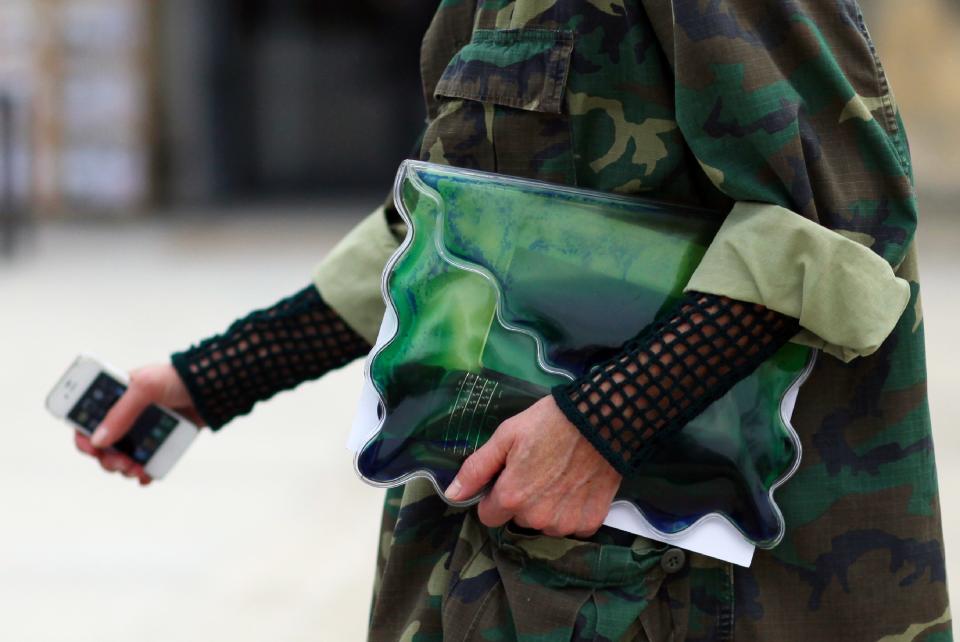 A regular sight on the 2012 street-style circuit: Christopher Kane’s gel-filled clutch.