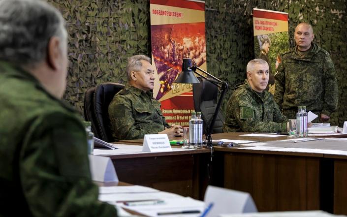 General Rustam Muradov, pictured, second right. - Rusian Defence Ministry Press Service