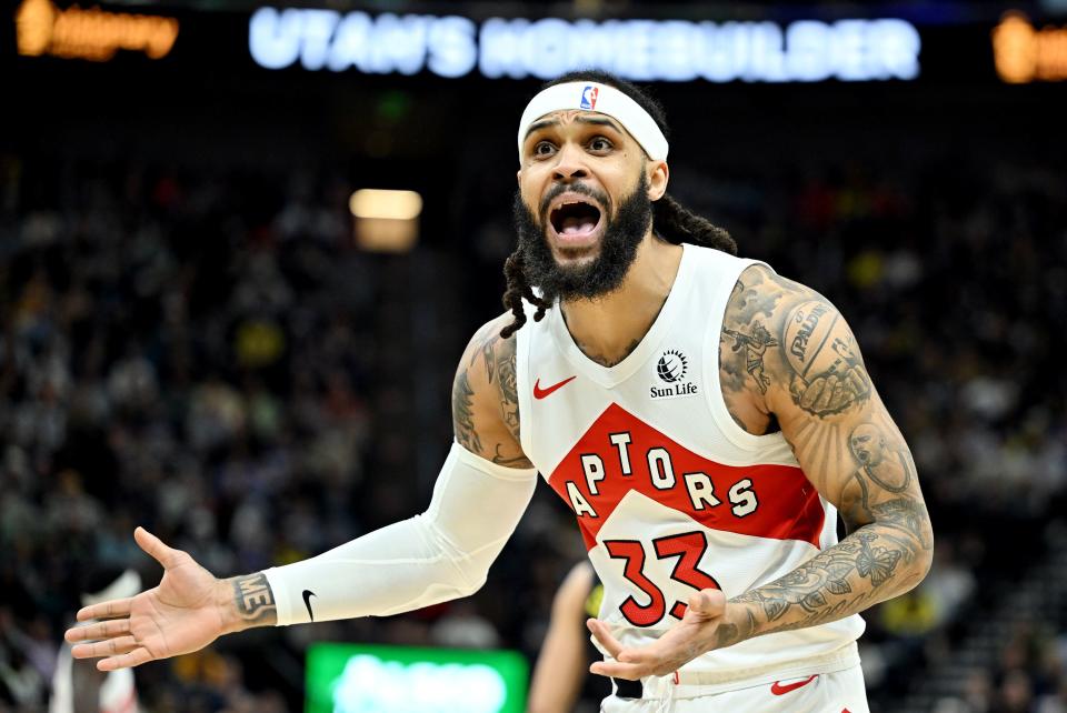 Toronto Raptors guard <a class="link " href="https://sports.yahoo.com/nba/players/6048" data-i13n="sec:content-canvas;subsec:anchor_text;elm:context_link" data-ylk="slk:Gary Trent Jr.;sec:content-canvas;subsec:anchor_text;elm:context_link;itc:0">Gary Trent Jr.</a> (33) questions the no-call as the Jazz and Raptors play at the Delta Center in Salt Lake City on Friday, Jan. 12, 2024. | Scott G Winterton, Deseret News