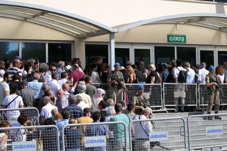 Friends and supporters of the defendants line up to enter the courtroom at the Silivri Prison and Courthouse complex in Silivri near Istanbul