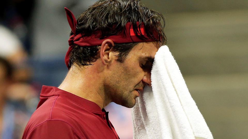 Roger Federer couldn’t handle the heat and humidity at Arthur Ashe Stadium in New York as he lost to John Millman. Pic: Getty