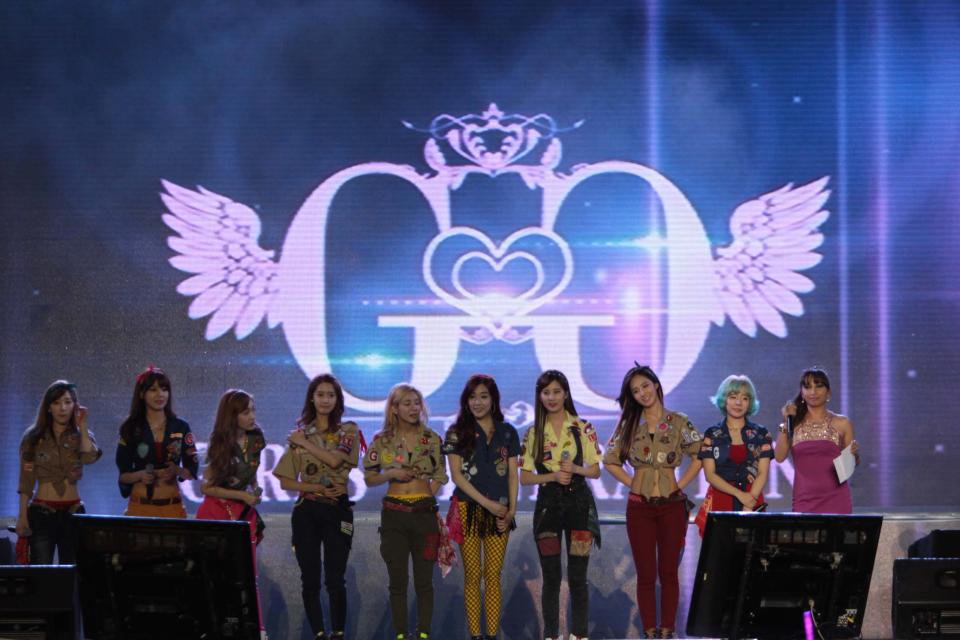 Kpop group "Girls Generation" performs for the crowd during the "Dream Kpop Fantasy Concert" held at the Mall of Asia grounds in Pasay city, south of Manila on 19 January 2013.