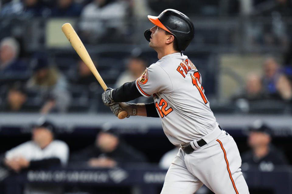 Baltimore Orioles' Adam Frazier watches his three-run home run during the seventh inning of the team's baseball game against the New York Yankees on Wednesday, May 24, 2023, in New York. (AP Photo/Frank Franklin II)