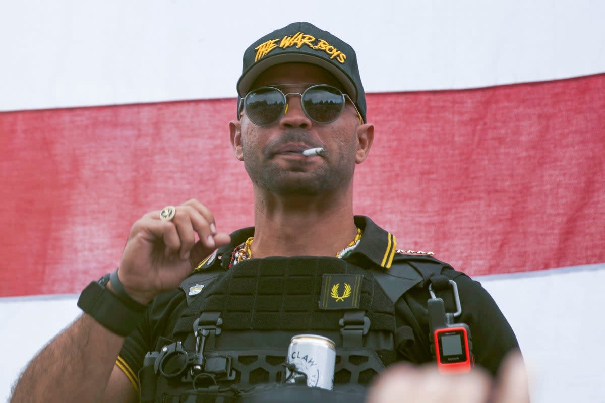 File. Proud Boys leader Henry ‘Enrique’ Tarrio wears a hat that says The War Boys during a rally in Portland, Ore., on 26 September 2020 (AP)