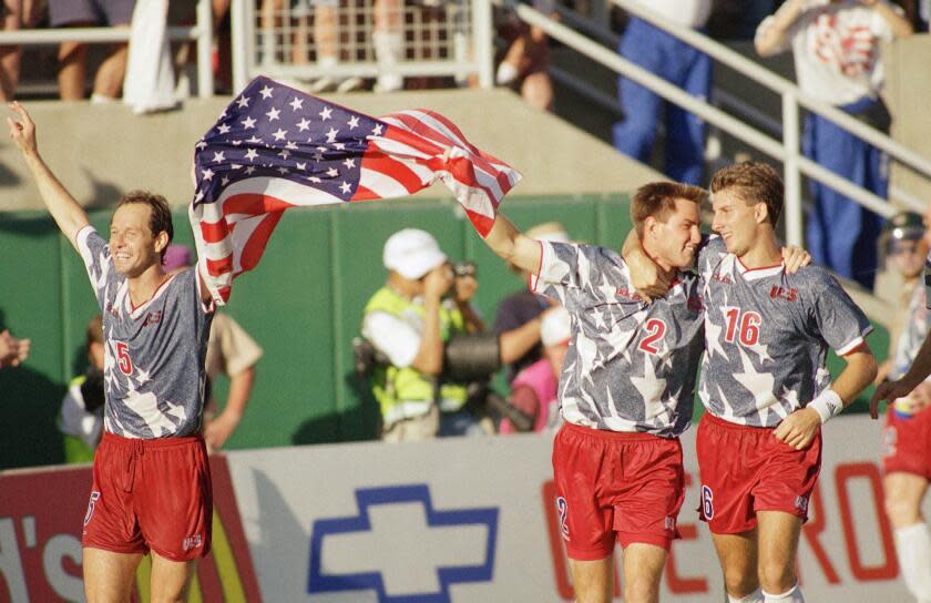 U.S. players Thomas Dooley, Mike Lapper and Mike Sorber celebrate their win over Colombia during the 1994 World Cup