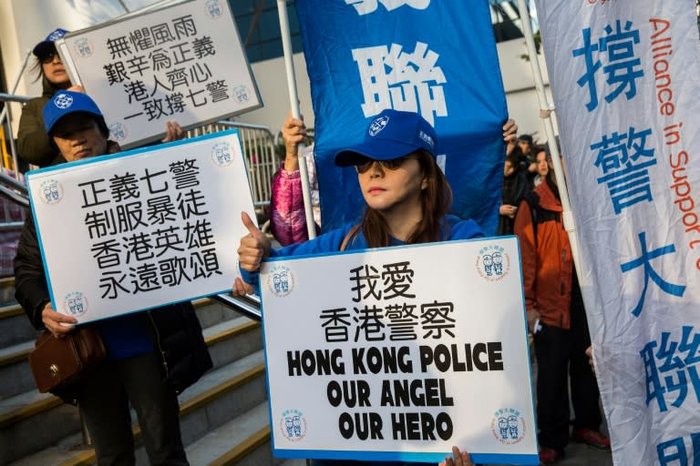 The trial of seven Hong Kong police officers attracted groups of pro- and anti-police demonstrators