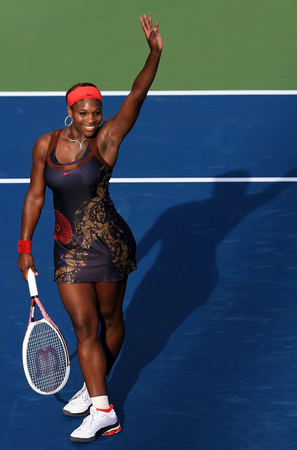 Serena Williams waves to the crowd after defeating Daniela Hantuchova of Slovakia during the U.S. Open at the USTA Billie Jean King National Tennis Center in Flushing Meadows Corona Park on August 31, 2006 in the Flushing neighborhood of the Queens borough of New York City