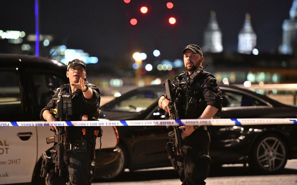 Armed Police on London Bridge - Credit: Dominic Lipinski /PA