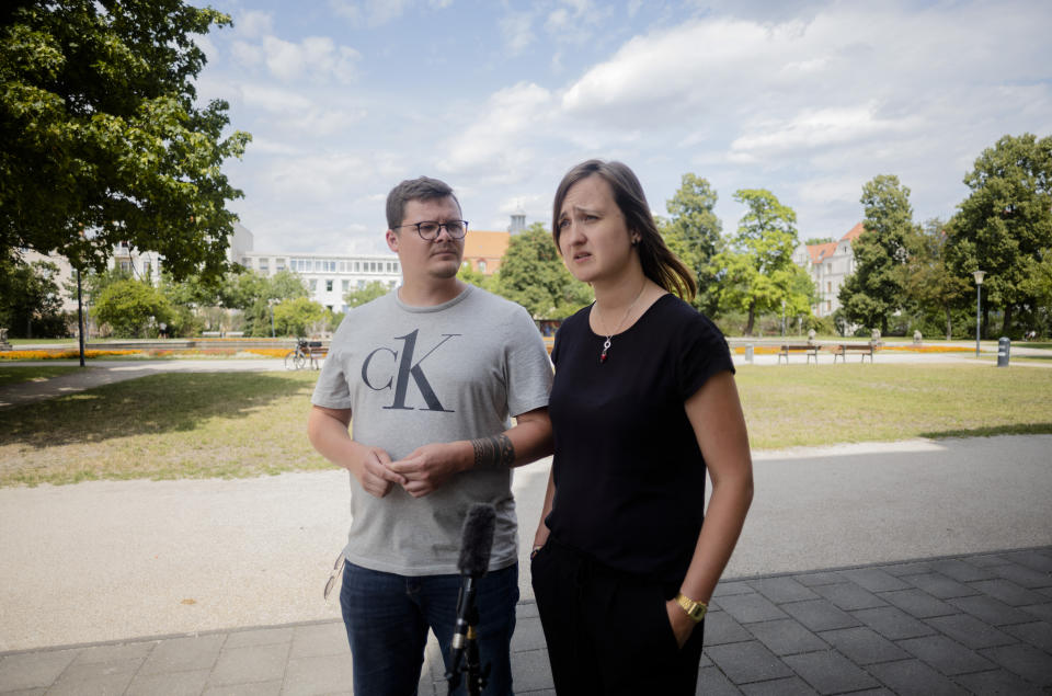 Teachers Laura Nickel, right, and Max Teske speak to The Associated Press during an interview in Cottbus, Germany, Wednesday, July 19, 2023. Two teachers in eastern Germany tried to counter the far-right activities of students at their small town high school. Disheartened by what they say was a lack of support from fellow educators, Laura Nickel and Max Teske decided to leave Mina Witkojc School in Burg. (AP Photo/Markus Schreiber)