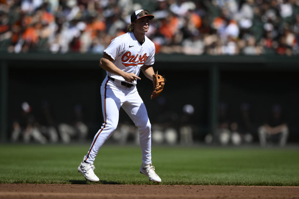 Baltimore Orioles second base Jackson Holliday (7) waits for the ball to go into play during the second inning of a baseball game against the Milwaukee Brewers, Sunday, April 14, 2024, in Baltimore. (AP Photo/Nick Wass)