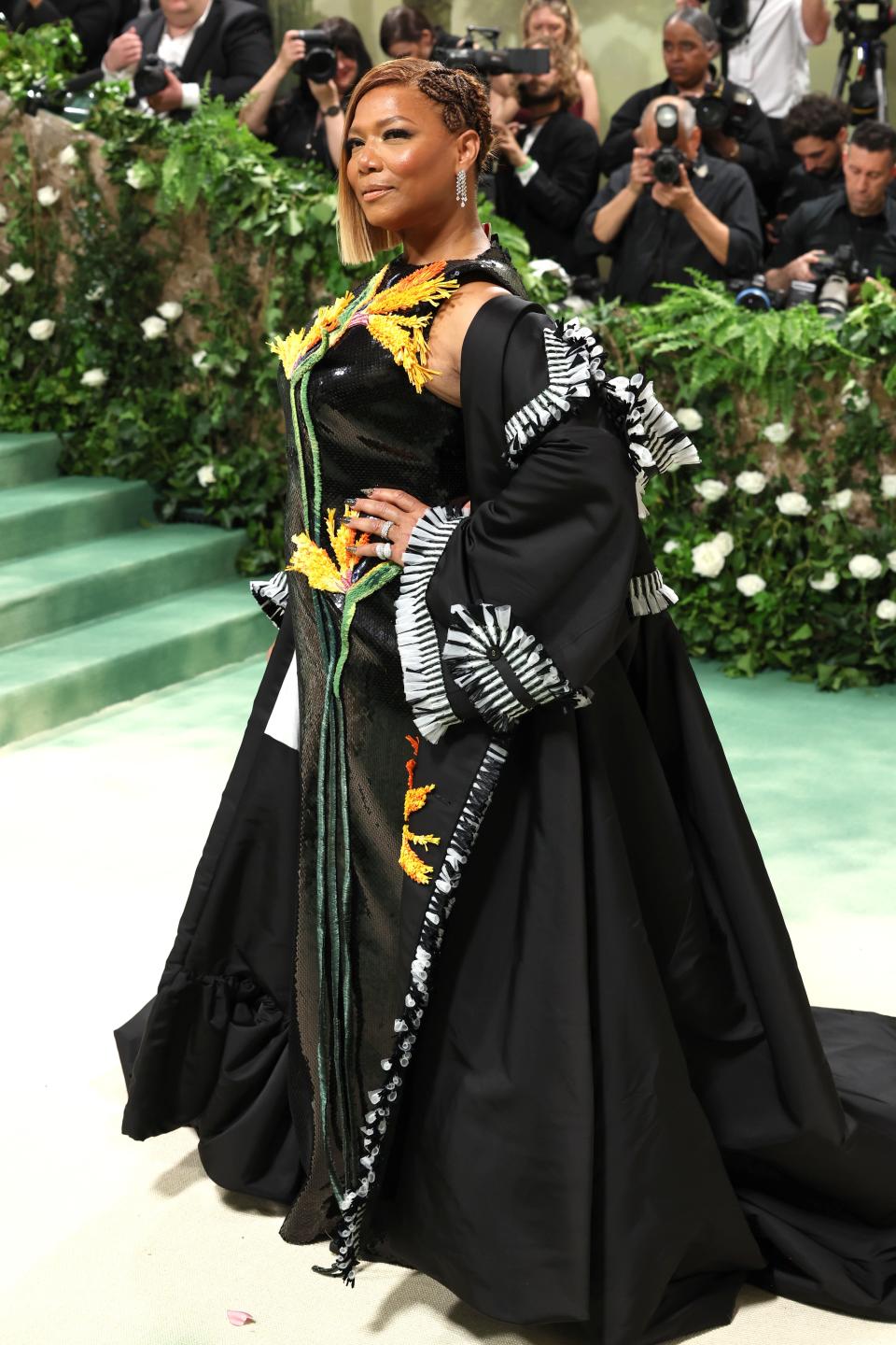 Queen Latifah attends her first Met Gala in custom Thom Browne (Getty Images)
