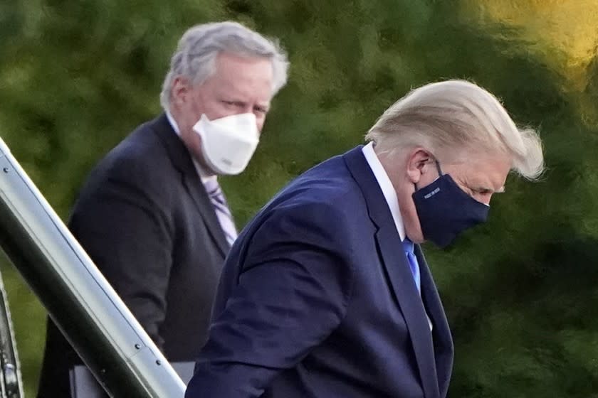 President Donald Trump arrives at Walter Reed National Military Medical Center, in Bethesda, Md., Friday, Oct. 2, 2020, on Marine One after he tested positive for COVID-19. (AP Photo/Jacquelyn Martin)