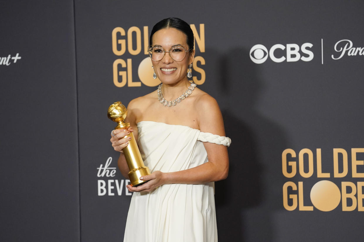 Ali Wong poses with the award for Best Performance by an Actress in a Limited Series, Anthology Series or a Motion Picture Made for TV for Beef at the 81st Golden Globe Awards.