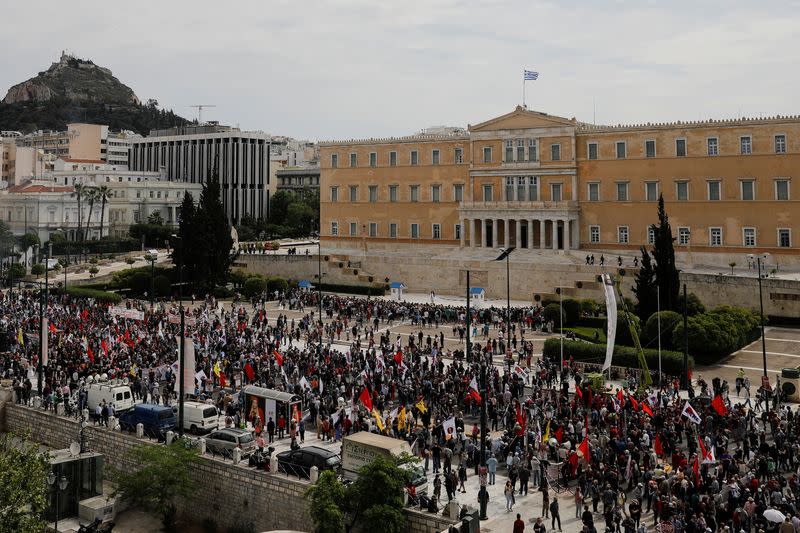 Greek Communist Party supporters take part in rally to mark May Day, in Athens