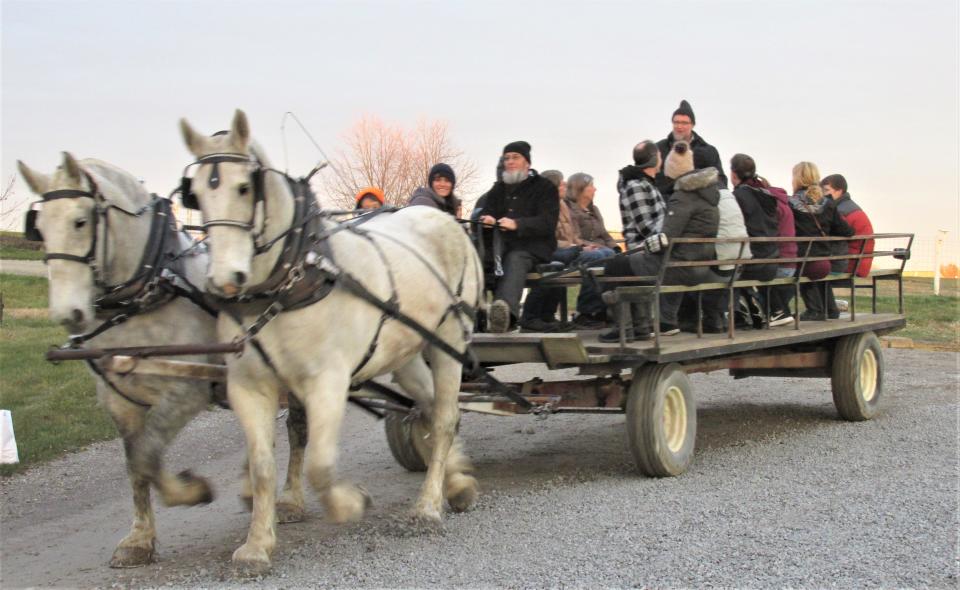 A  horse-drawn wagon helps transport visitors around the Farm at Walnut Creek during Journey to Bethlehem activities last year.