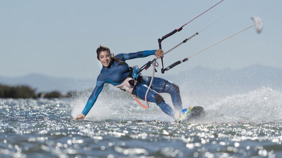 female kite surfer, tarifa, costa de la luz, andalusia, spain
