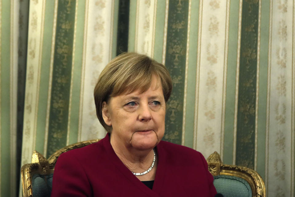 German Chancellor Angela Merkel is seen during a meeting with Greece's President Prokopis Pavlopoulos at the presidential palace in Athens, Friday, Jan. 11, 2019. Merkel is widely blamed in Greece for the austerity that the country has lived through for much of the past decade, which led to a sharp and prolonged recession and a consequent fall in living standards. (AP Photo/Thanassis Stavrakis)