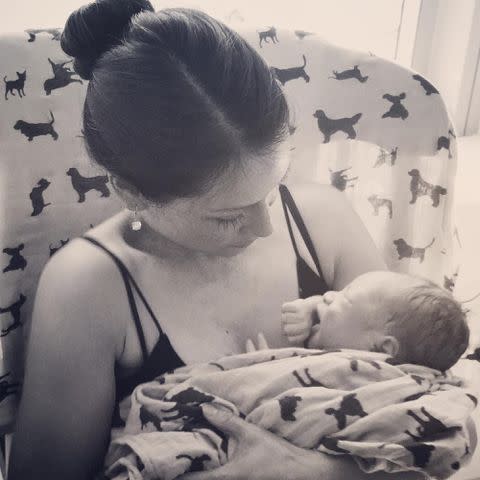 <p>Lucy Liu Instagram</p> Lucy Liu holding her son Rockwell Lloyd Liu as a newborn.