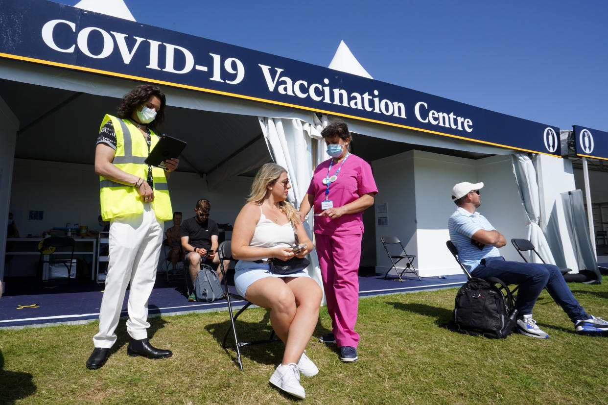 Members of the public at a Covid-19 vaccination centre on site during day three of The Open at The Royal St George's Golf Club in Sandwich, Kent. Picture date: Saturday July 17, 2021. (Photo by Gareth Fuller/PA Images via Getty Images)