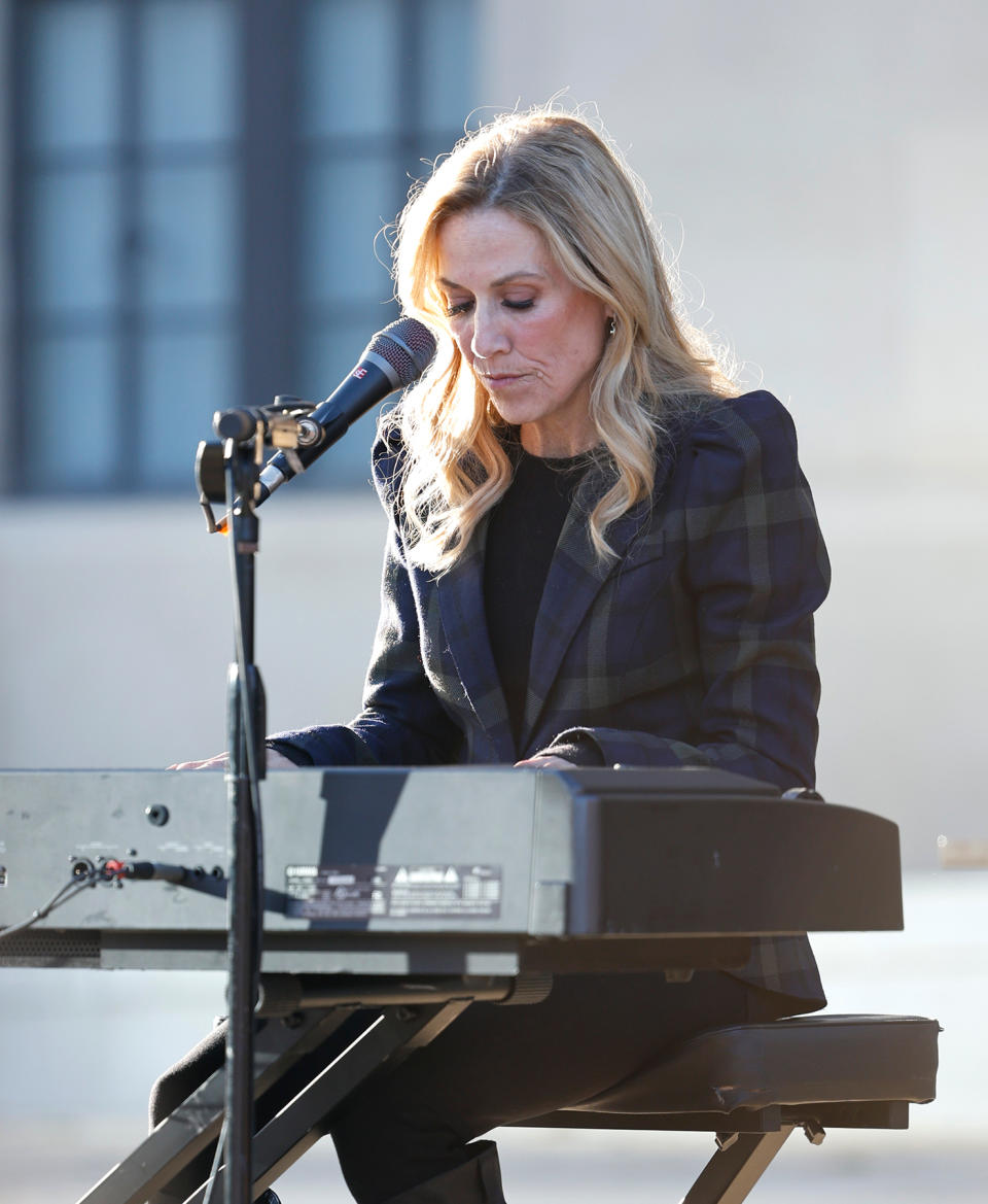 NASHVILLE, TENNESSEE - MARCH 29: Singer & songwriter Sheryl Crow performs at a candlelight vigil to mourn and honor the lives of the victims, survivors and families of The Covenant School on March 29, 2023 in Nashville, Tennessee. (Photo by Jason Kempin/Getty Images)
