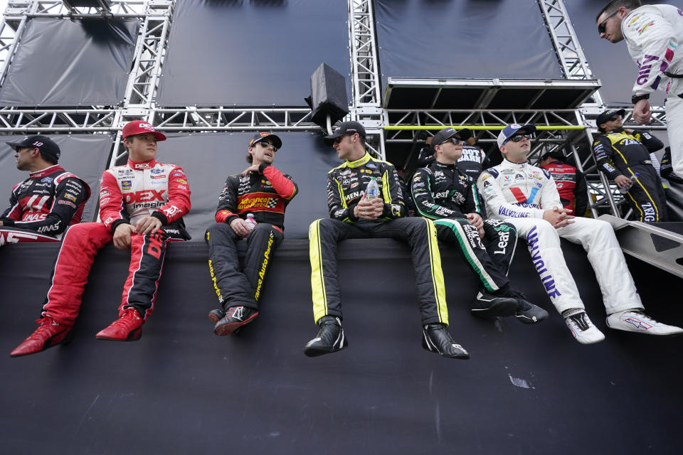 Drivers wait to be introduced before a NASCAR Cup Series auto race Sunday, June 26, 2022, in Lebanon, Tenn. (AP Photo/Mark Humphrey)