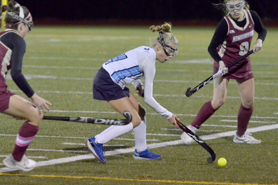 CANTON -- 11/16/22 -- Sandwich's Sadie Clarkin looks to pass in a first quarter play. 
Sandwich High School played Newburyport High School in Division 3 state semifinal field hockey action Wednesday at Canton High School. Sandwich won 1-0.