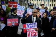 Haitian immigrants and supporters rally to reject DHS Decision to terminate TPS for Haitians, at the Manhattan borough in New York, U.S., November 21, 2017. REUTERS/Eduardo Munoz